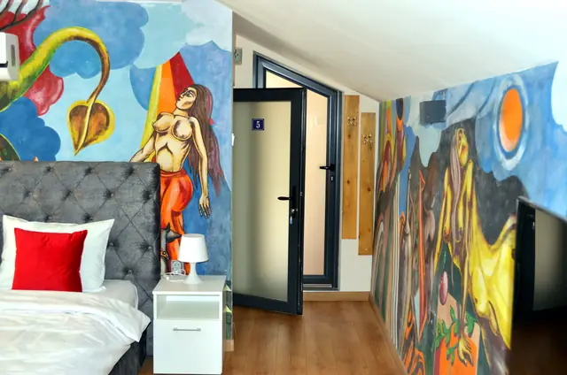 Bedroom with murals in Artistic Loft