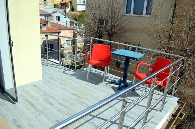 Balcony with table and chairs, Artistic Loft