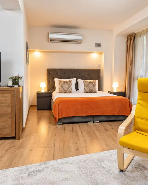 Studio with double bed and chest of drawers, French Windows Studio