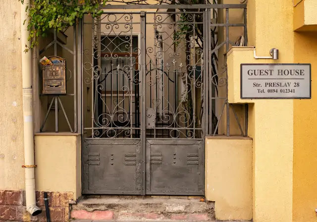 Entrance with the GUEST HOUSE sign at 28 Preslav St.