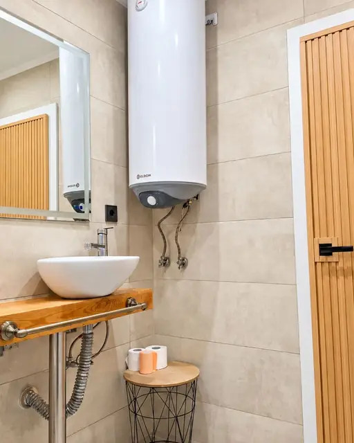 Bathroom with washbasin and water heater, Sunny Balcony