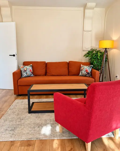 Spacious living room of Sunny Balcony with sofa and coffee table