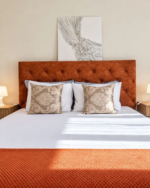 Double bed in the second bedroom of Sunny Balcony